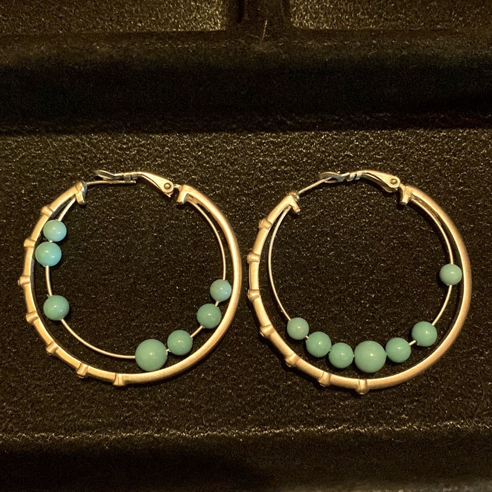 Classic stone turquoise hoops. Silver finish. Pierced.